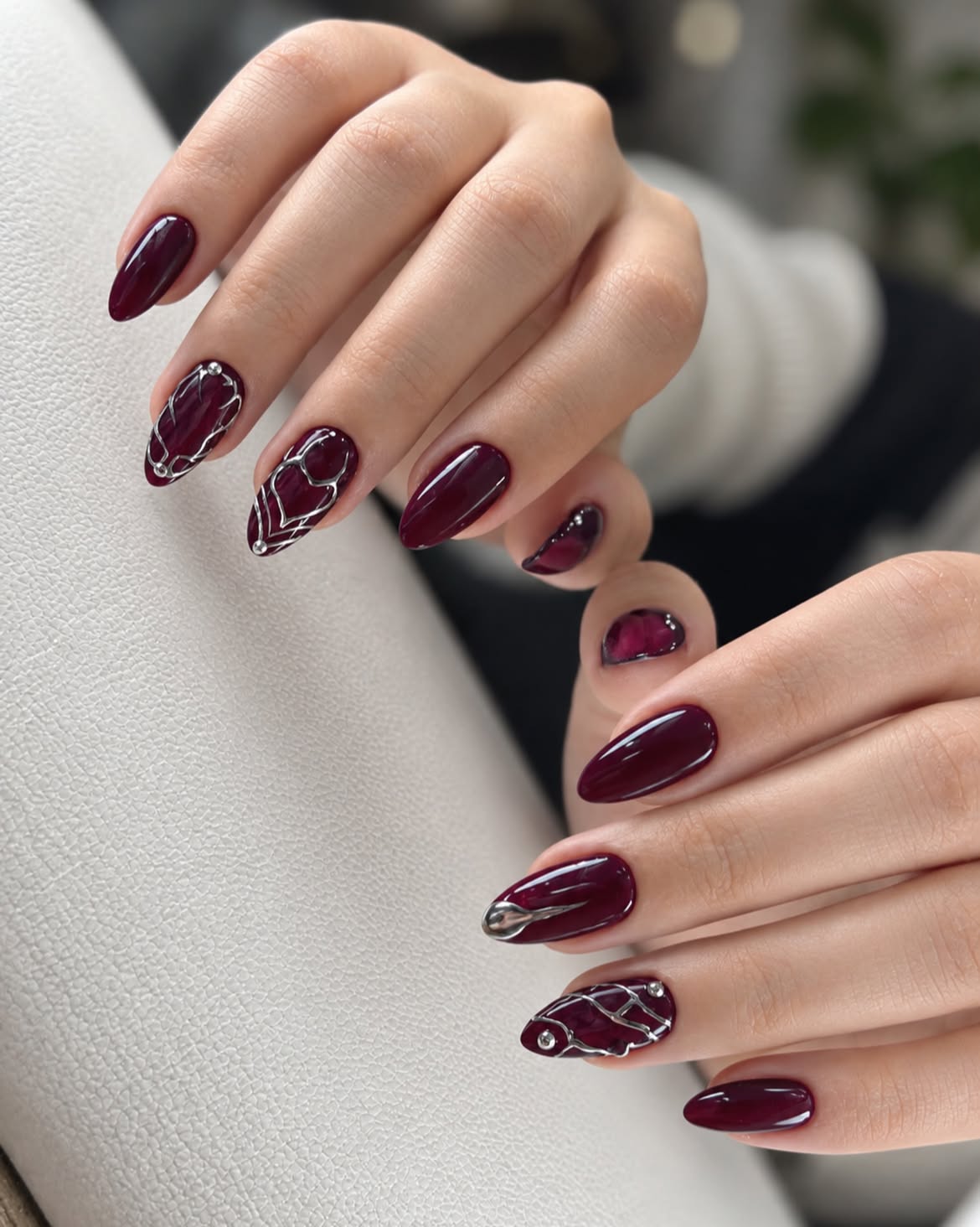 Deep Burgundy Chrome Swirl Almond Nails