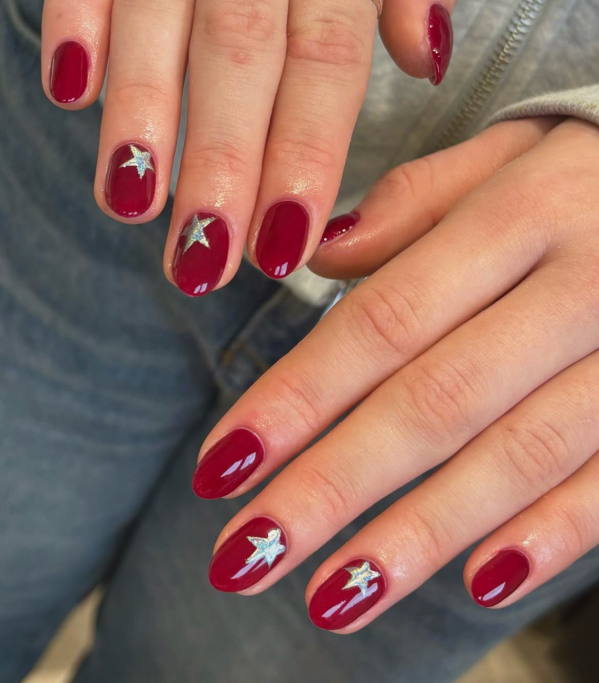Deep Burgundy Oval Nails with Silver Star Accents