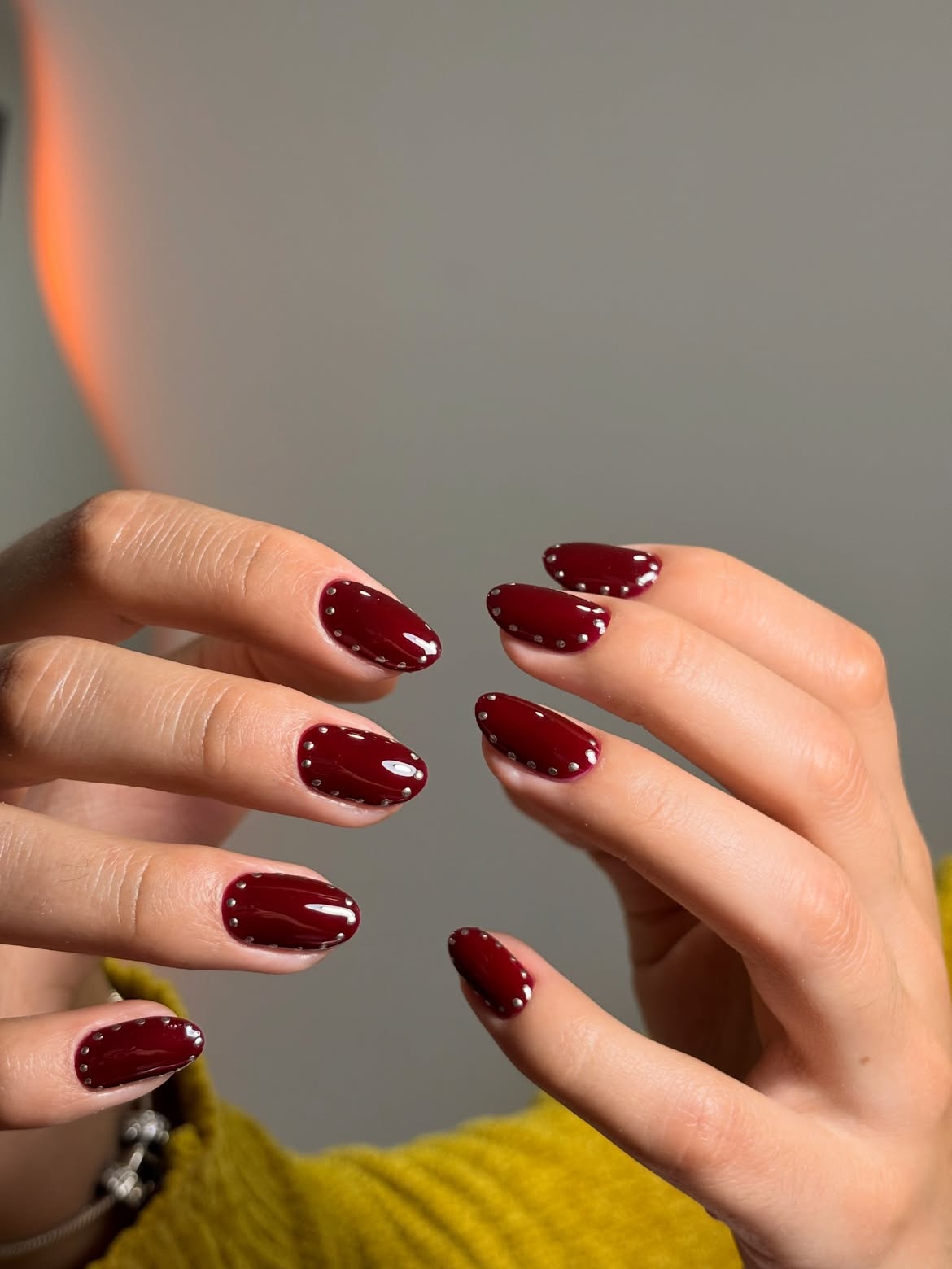 Deep Burgundy Oval Nails with Silver Studs