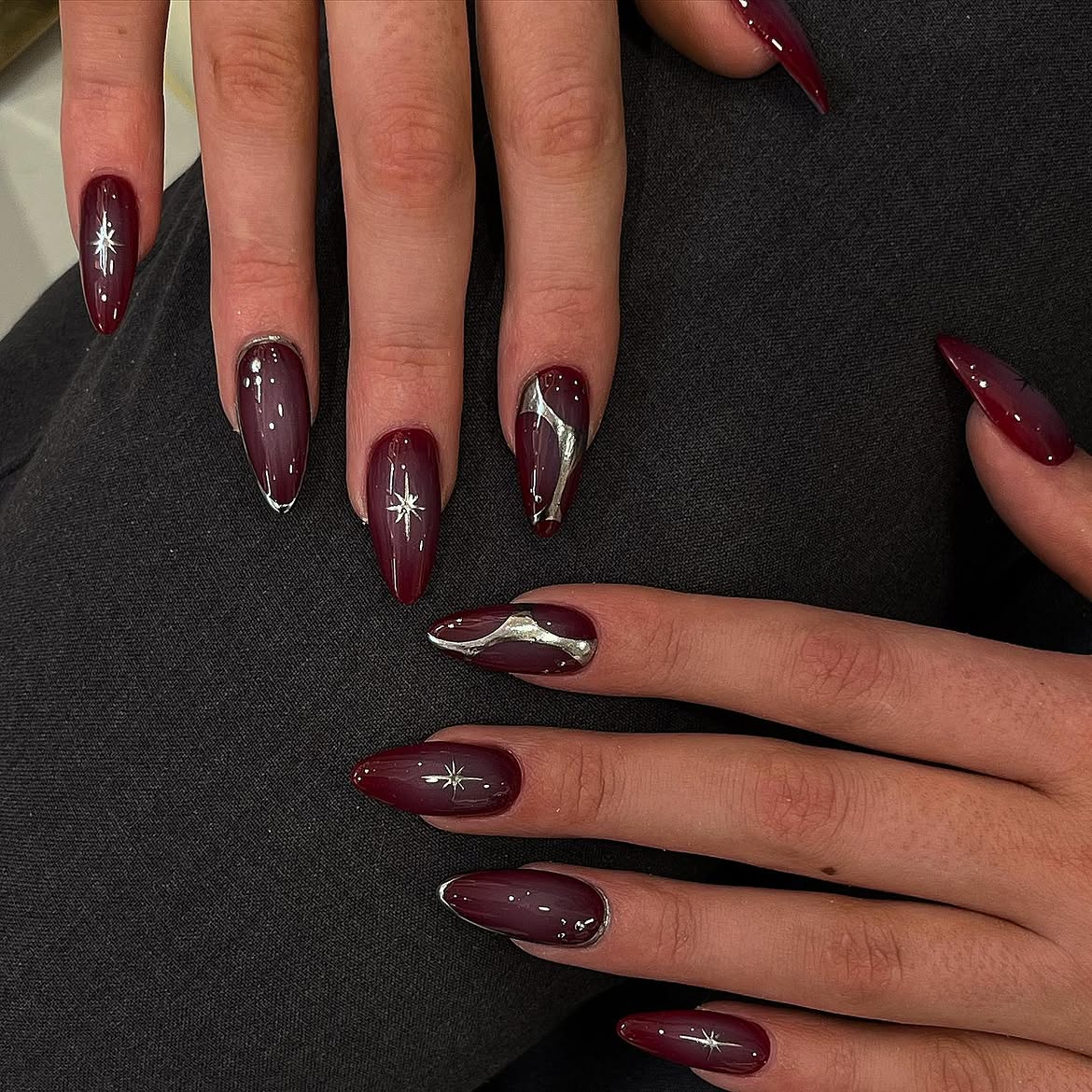 Deep Burgundy Stiletto Nails with Silver Accents