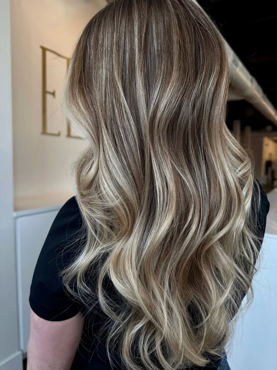 Dimensional Ash Blonde Balayage With Loose Waves