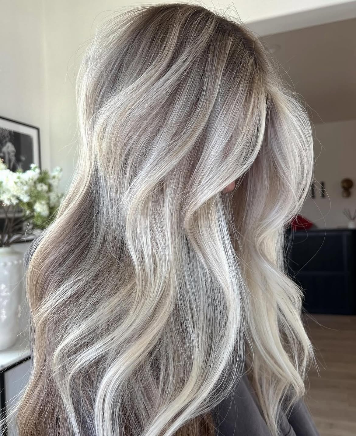 Dimensional Platinum Blonde With Soft Face Framing Layers