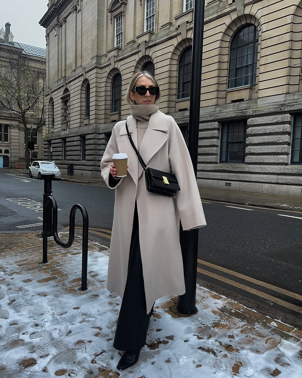Elegant Cream Coat Over Neutral Tones