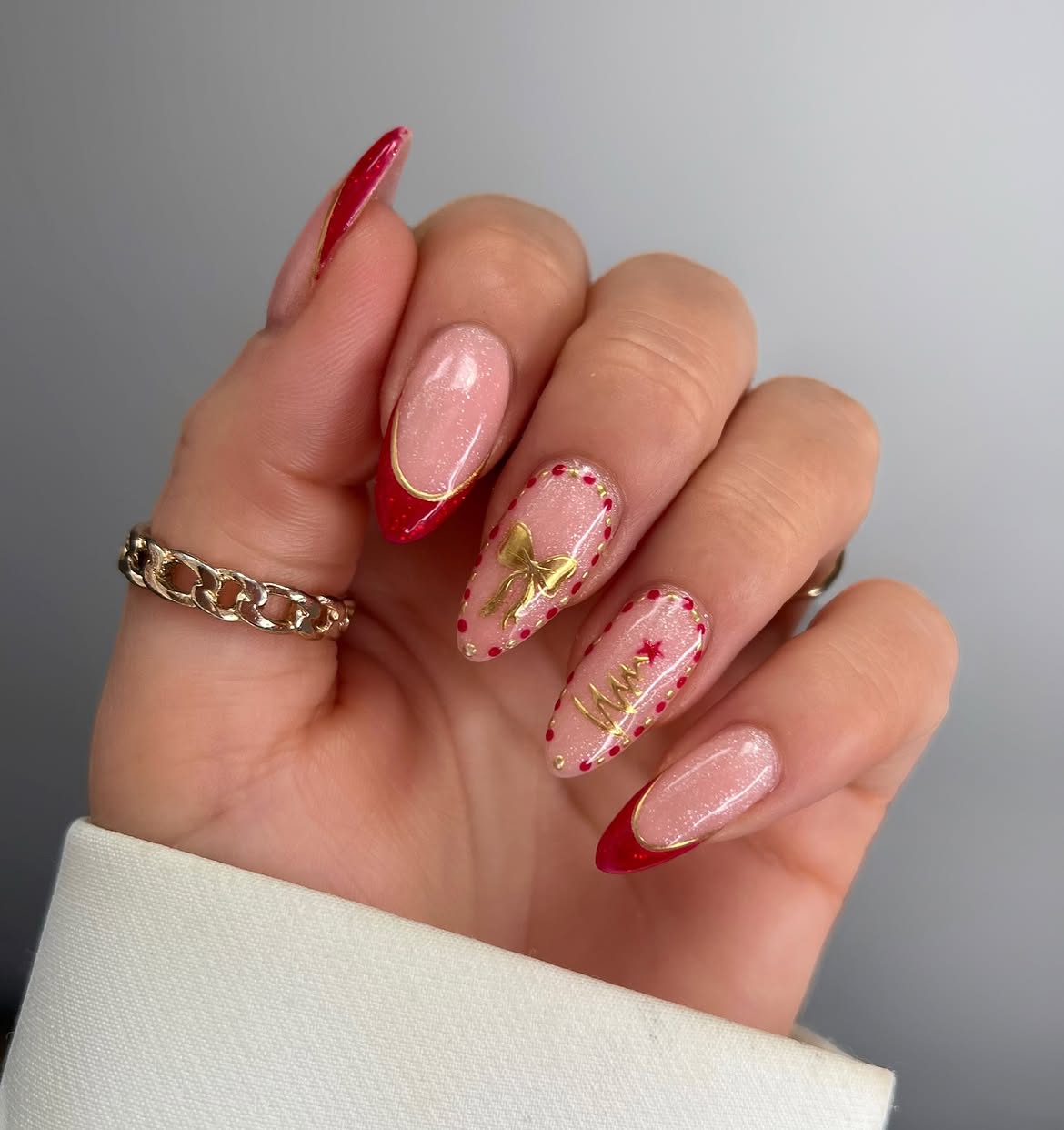 Festive Red And Gold Bow Almond Nails