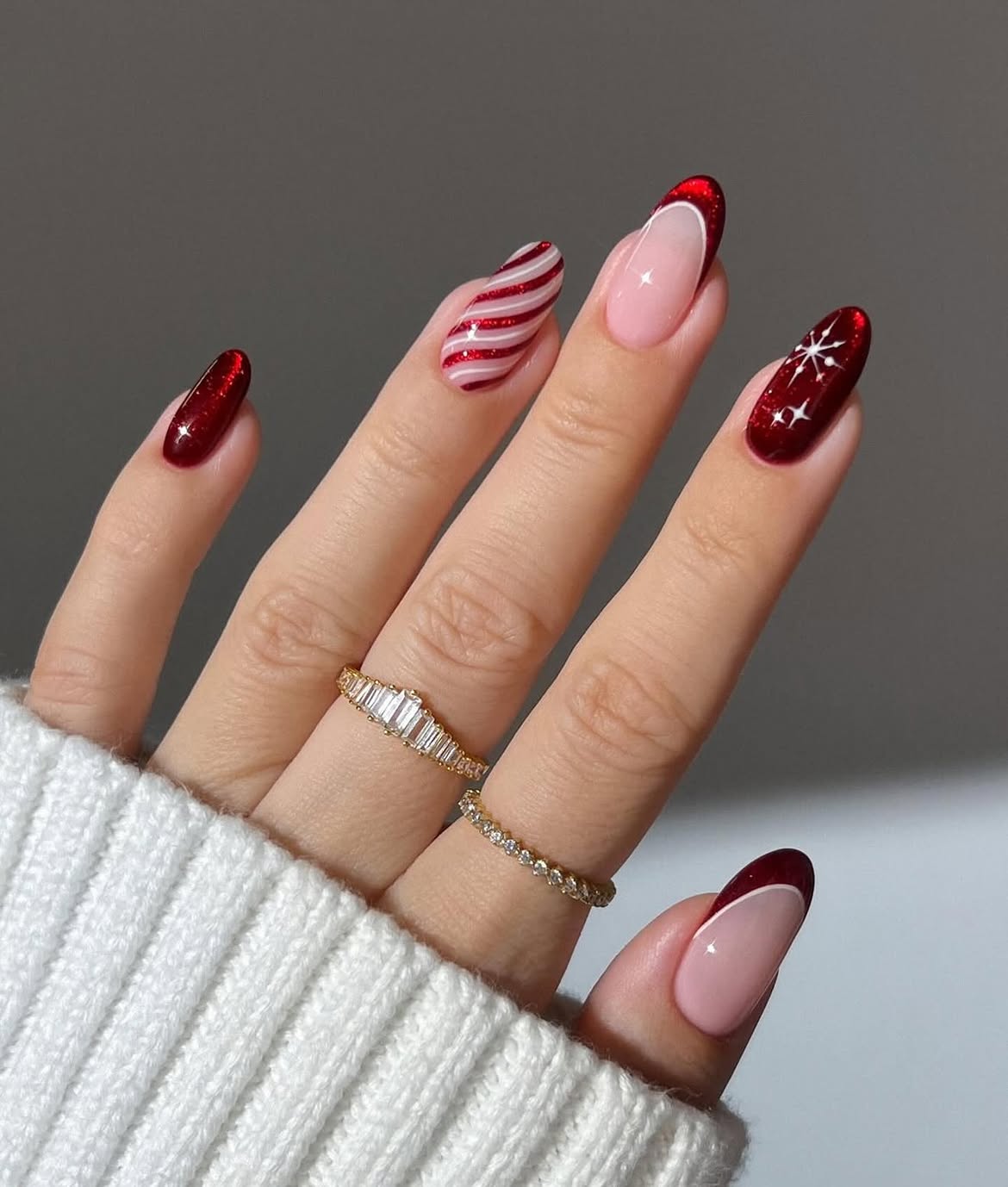 Festive Red Candy Cane Almond Winter Nails