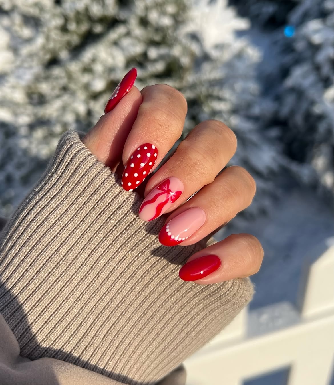 Festive Red Polka Dot And Bow Almond Nails