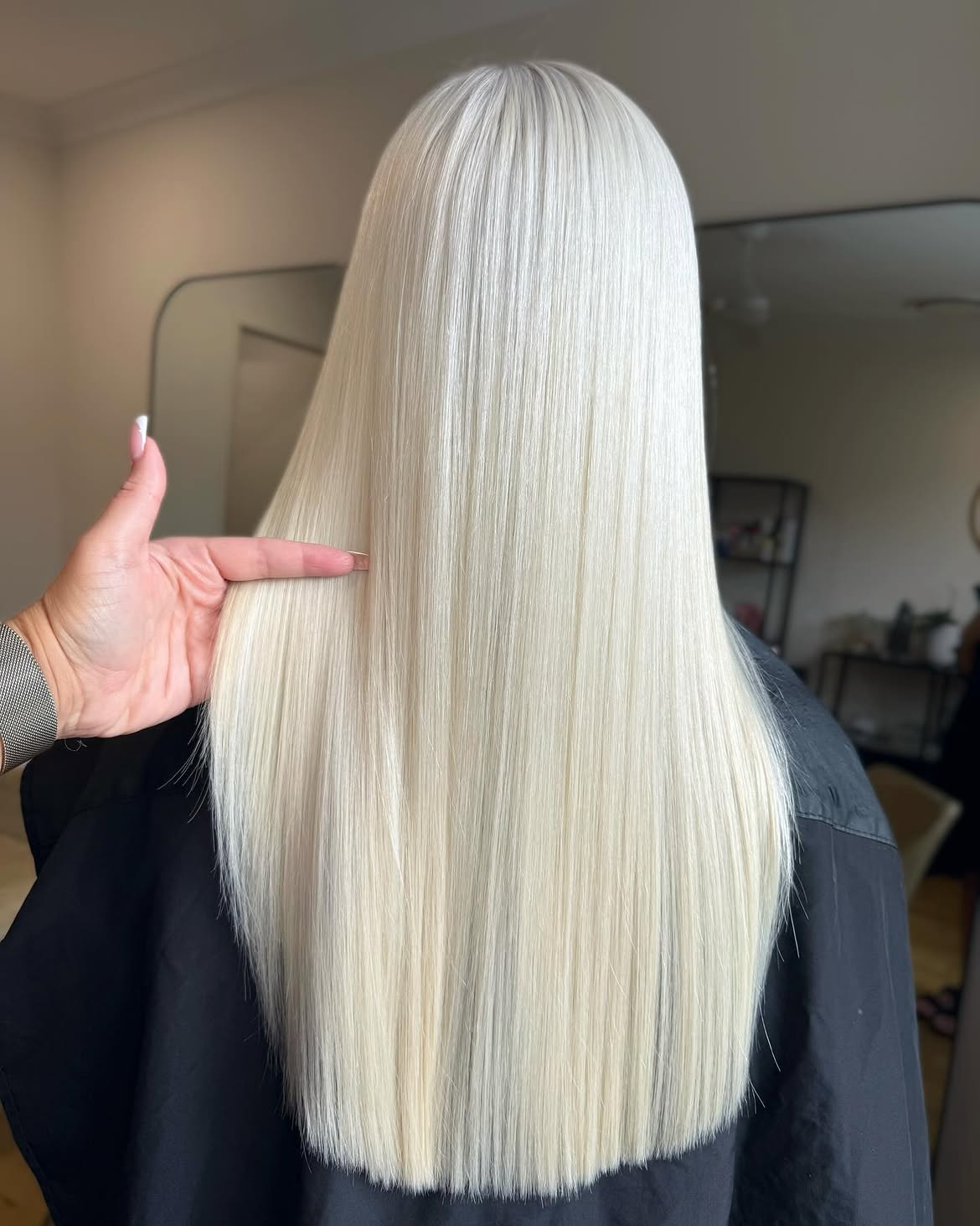 Glass Hair Finish On Long Platinum Blonde Locks