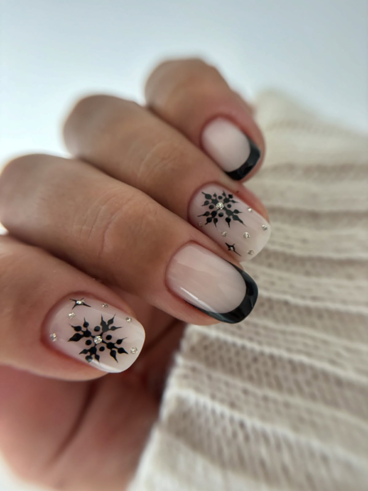 Glossy Black French Tips With Snowflake Accent Nails