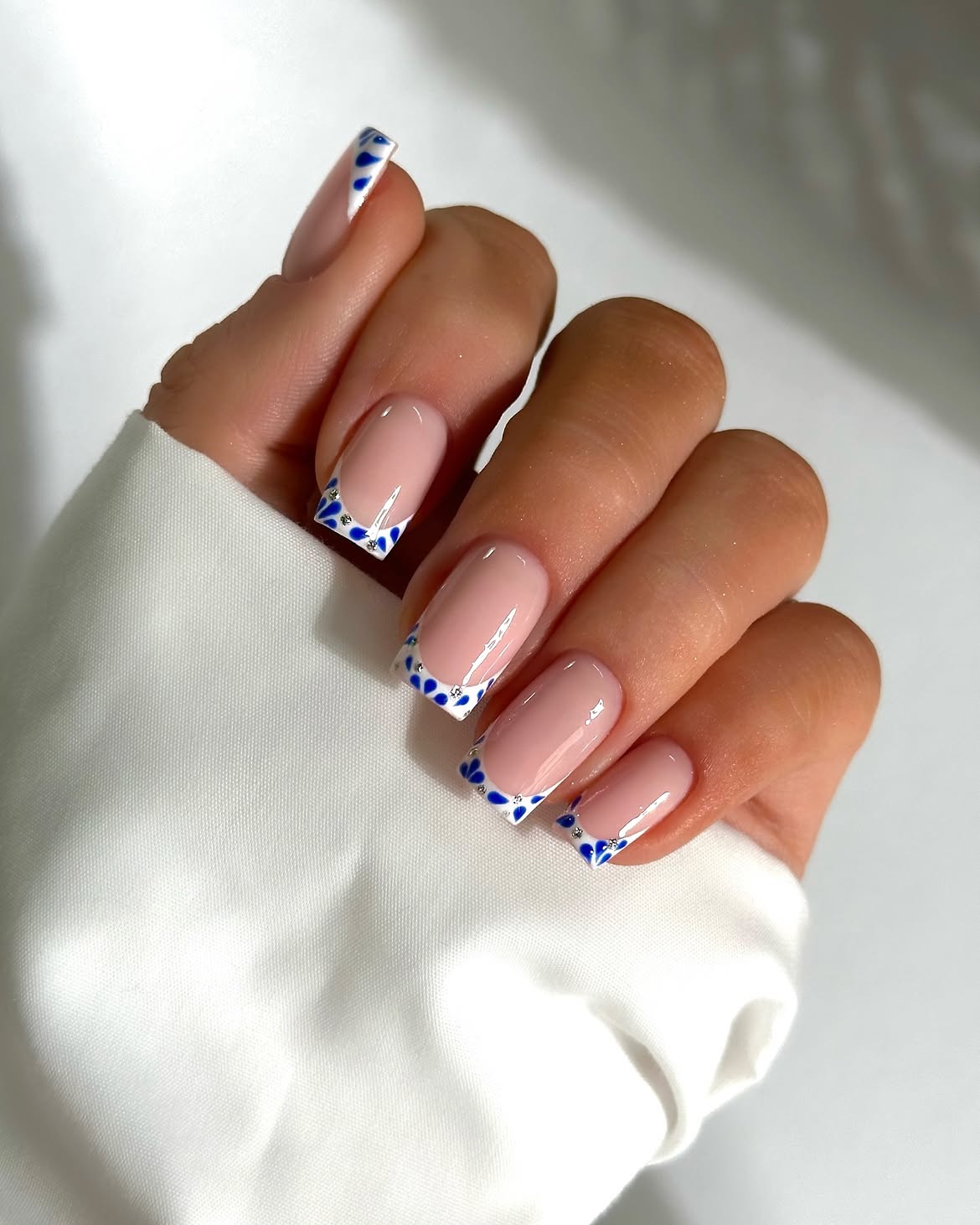 Glossy Blue Floral French Tip Coffin Nails