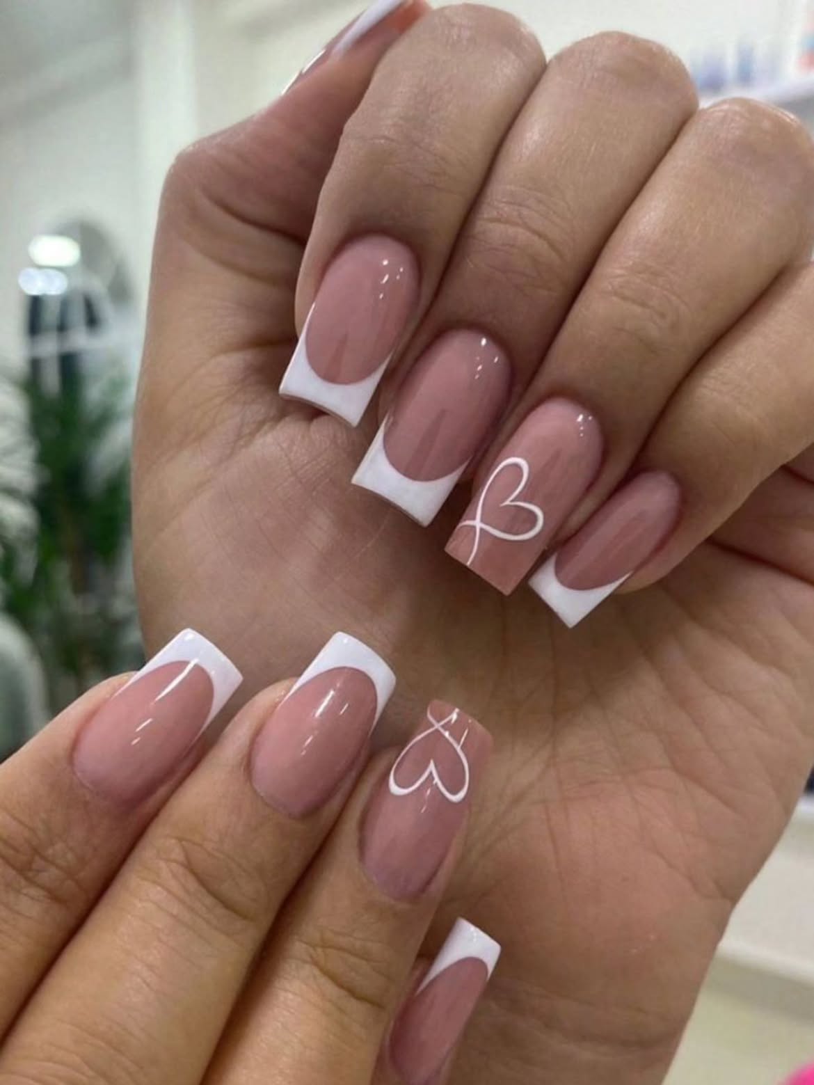 Glossy Nude Coffin French Nails With White Hearts