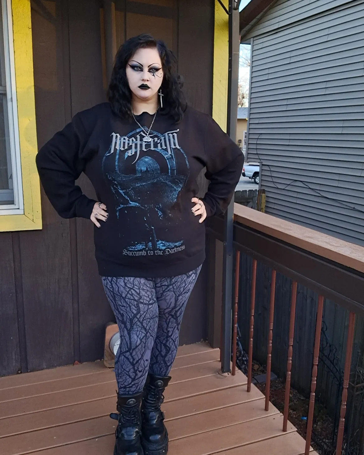 Gothic Graphic Sweatshirt And Patterned Leggings Look
