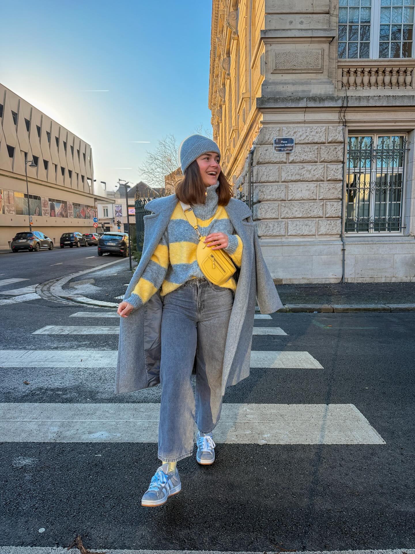 Grey Longline Coat Over Striped Knit and Jeans
