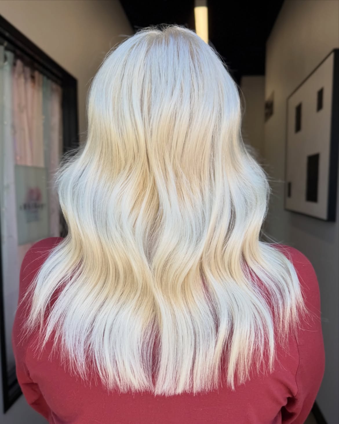 Icy Platinum Blonde Waves With Blunt Ends