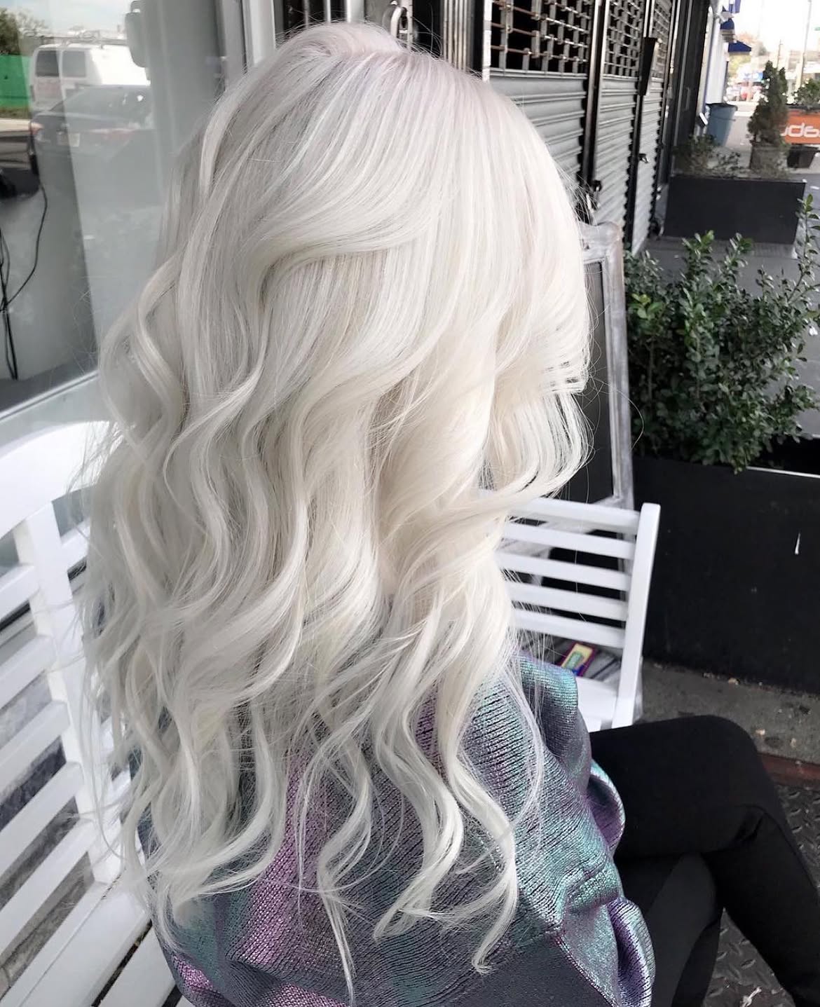 Icy Platinum Blonde Waves With Mid Back Length