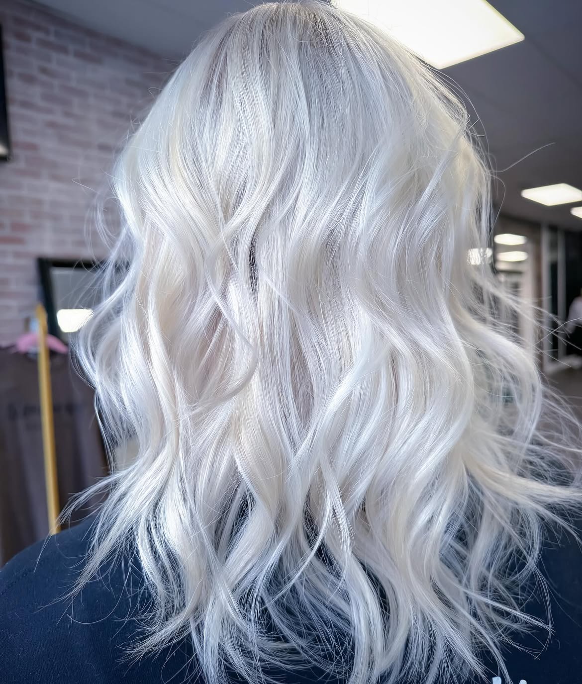 Icy Platinum Blonde Waves With Textured Layers