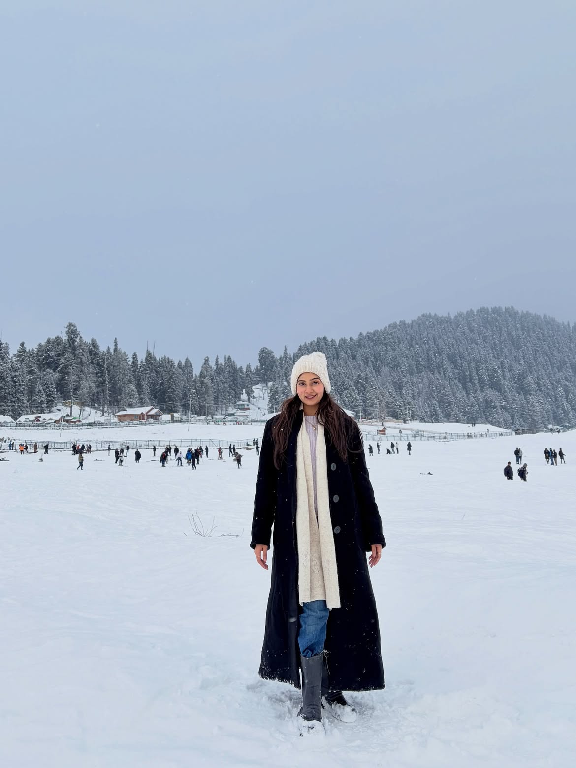 Long Black Wool Coat With Cream Knit And Denim