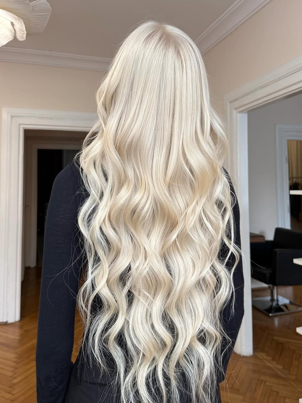 Long Wavy Platinum Blonde With Lived In Roots