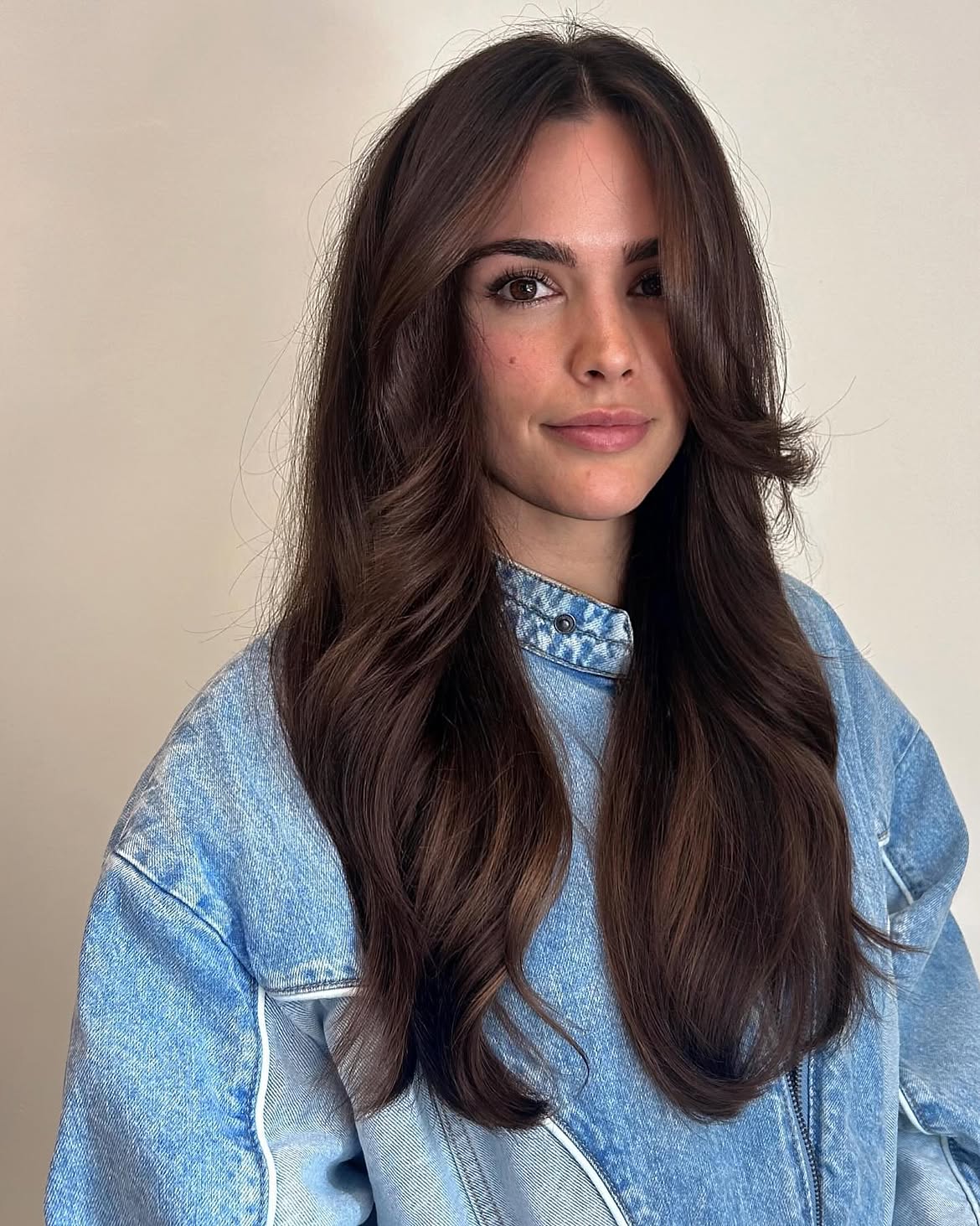 Luxurious Blowout Layers With Voluminous Curtain Bangs