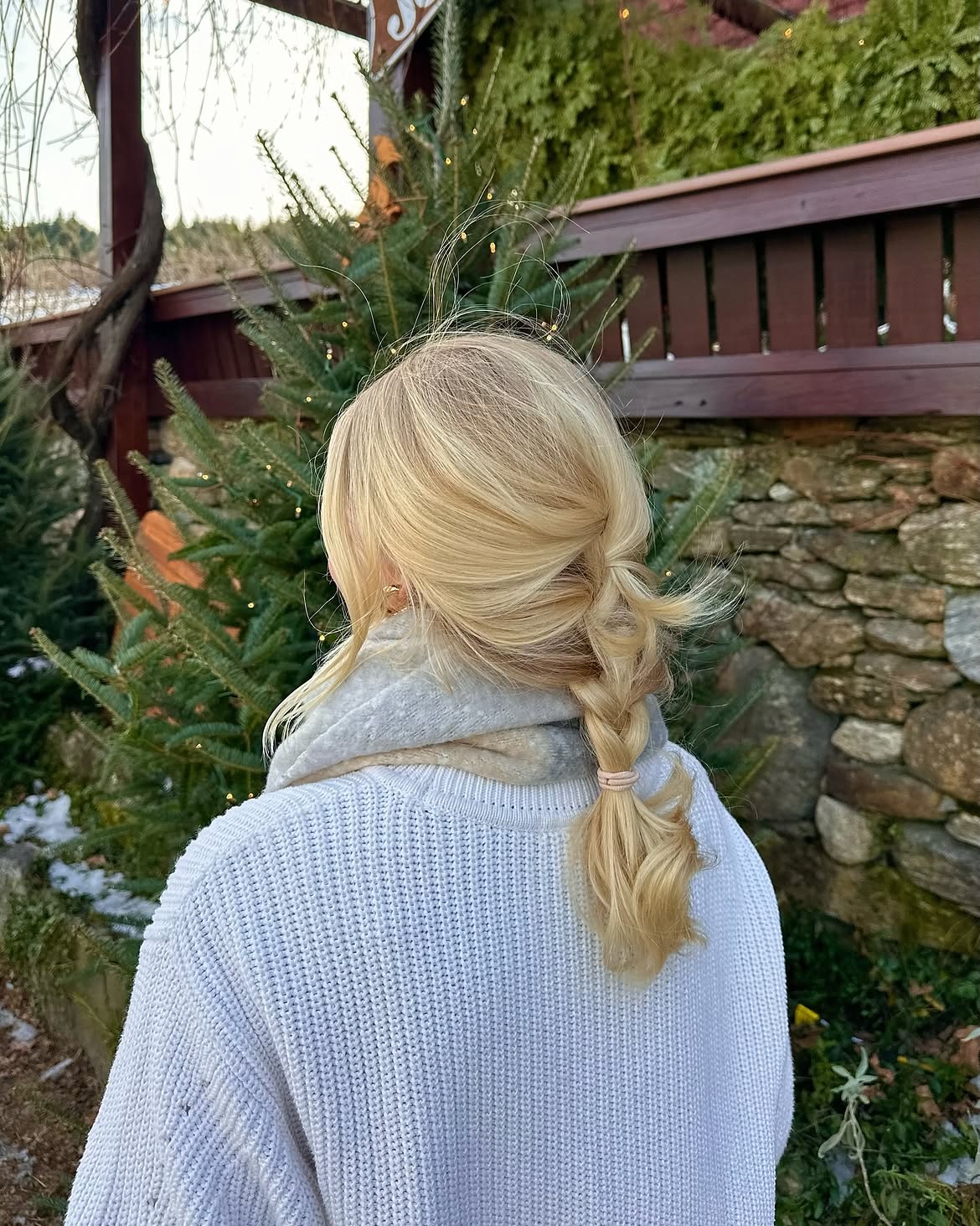 Messy Braided Low Ponytail With Blonde Highlights