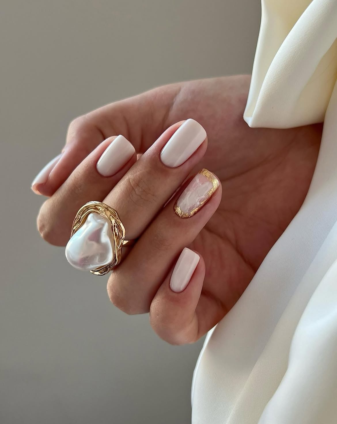 Milky White Nails with Gold Leaf Accent