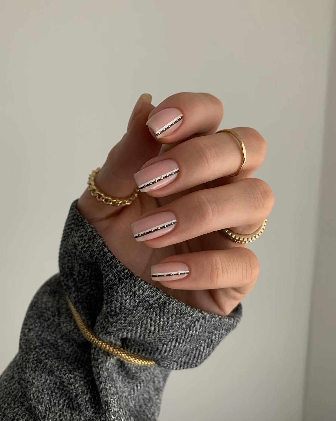 Minimalist Nude Nails With Metallic Striping