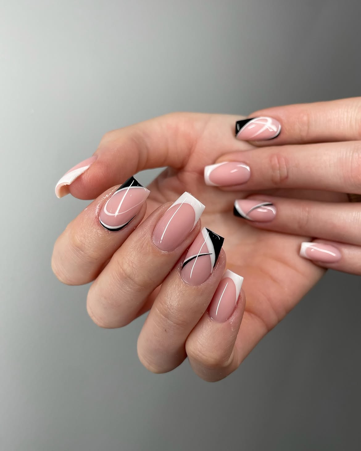 Modern French Tip with Black Swirl Accent