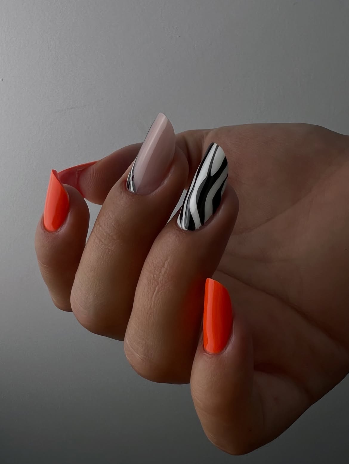 Neon Orange and Zebra Print Almond Nails