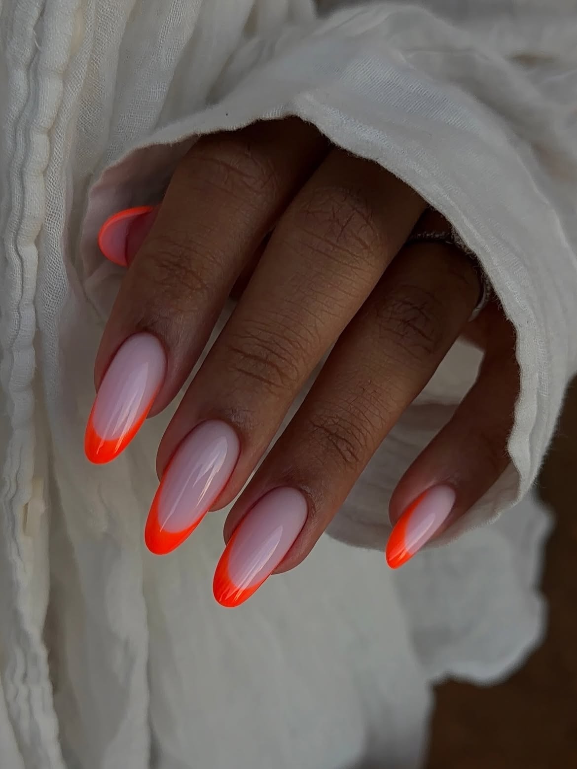 Neon Orange French Tip Almond Nails