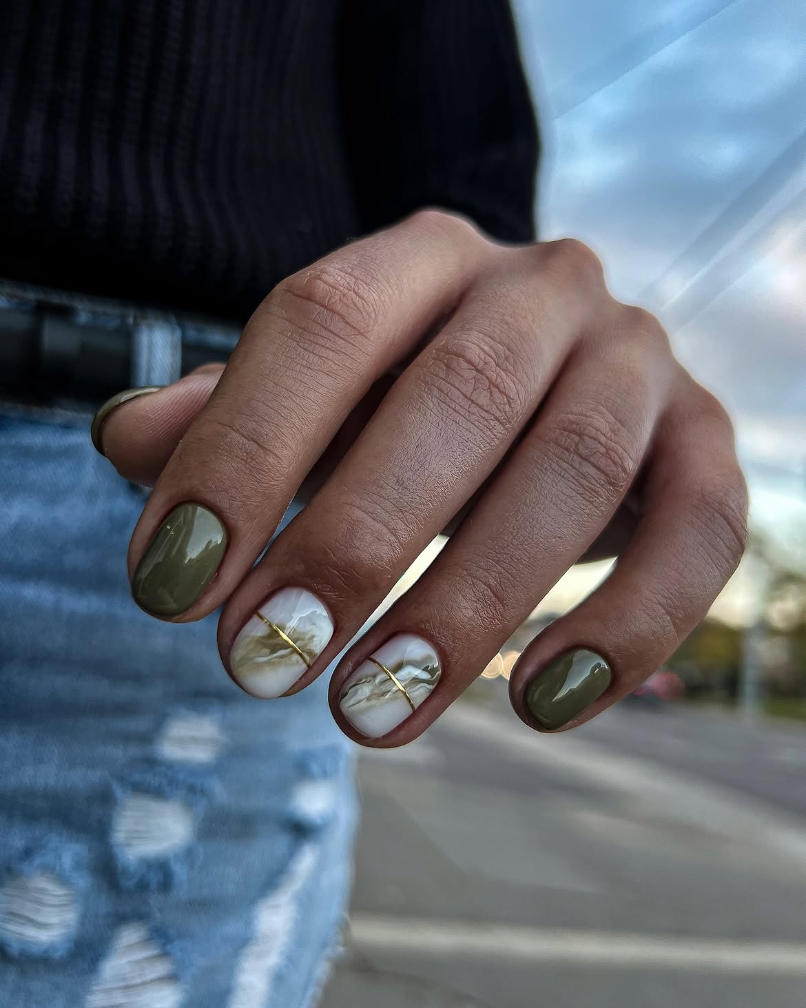 Olive Green Marble Nails with Gold Stripe Detail