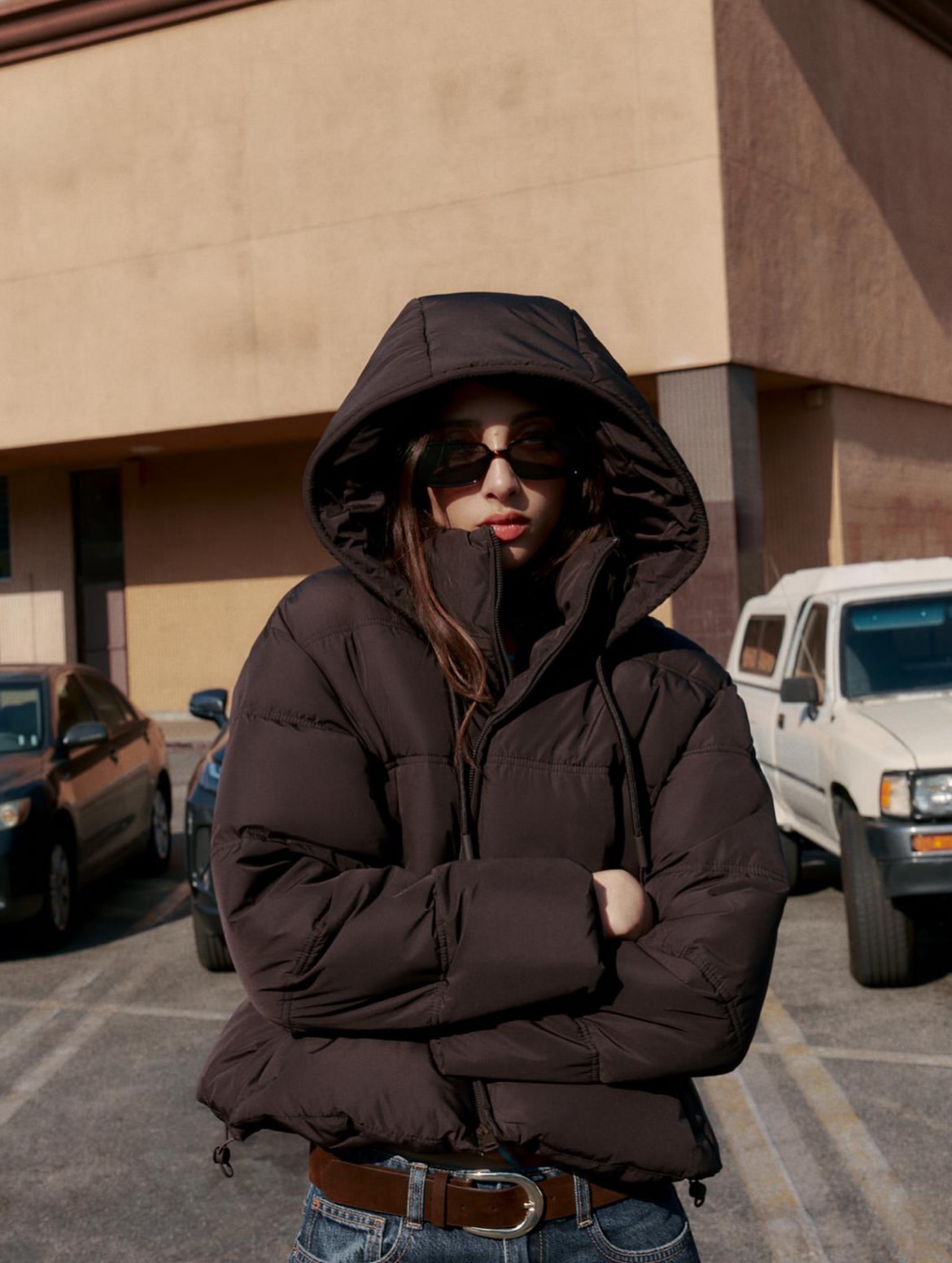 Oversized Hooded Puffer Jacket With Denim Jeans