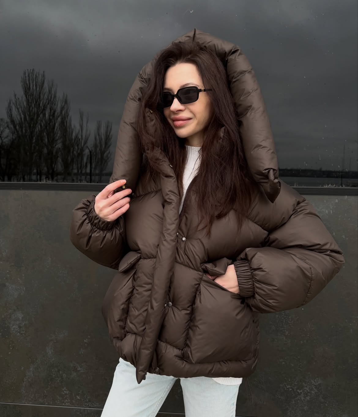 Oversized Puffer Coat With Light Wash Jeans Outfit
