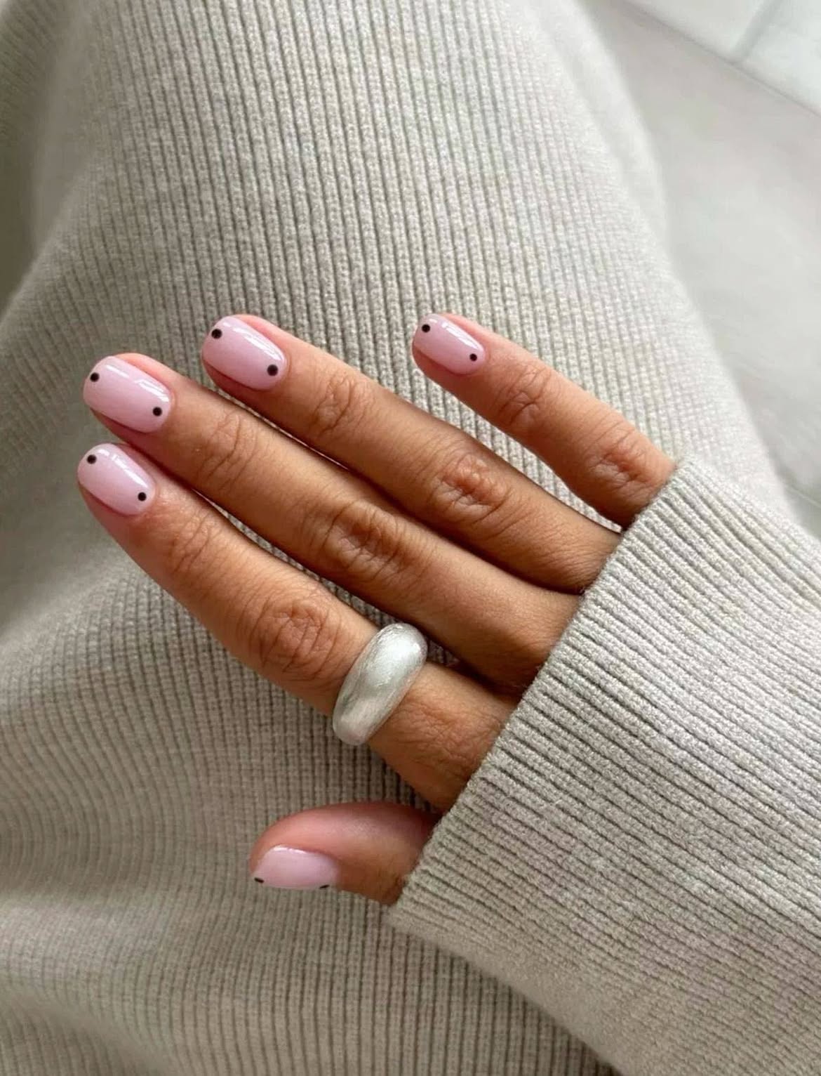 Pale Pink Nails With Black Dot Accents