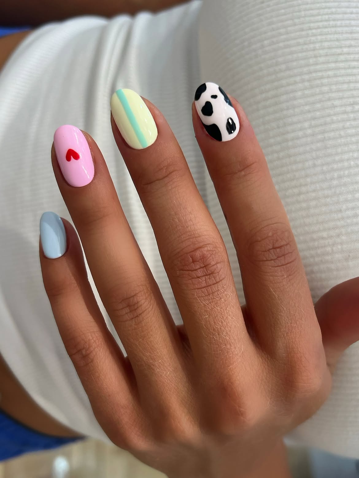 Playful Pastel Cow Print & Heart Oval Nails