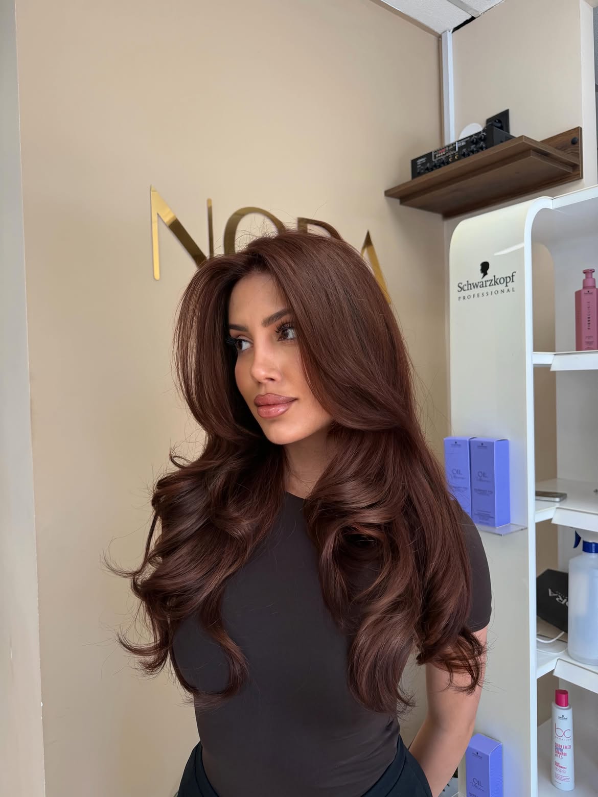 Rich Copper Brown Waves With Face-Framing Layers