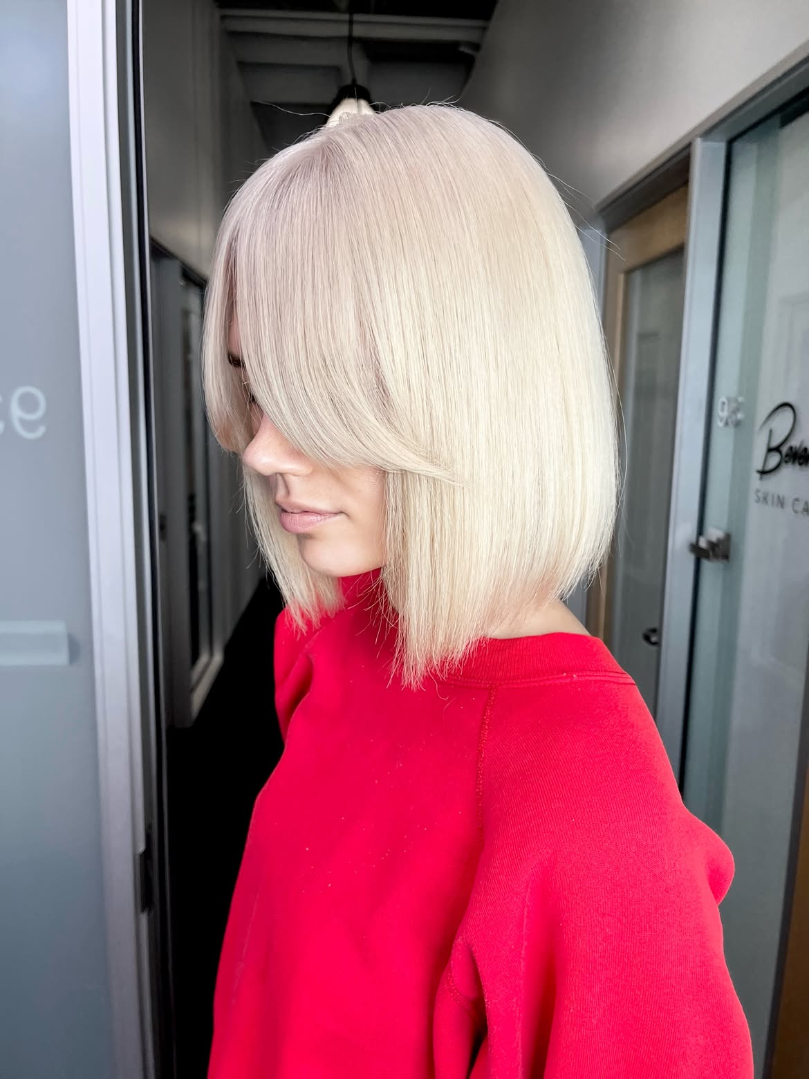 Sleek Platinum Blonde Bob With Face Framing Bangs