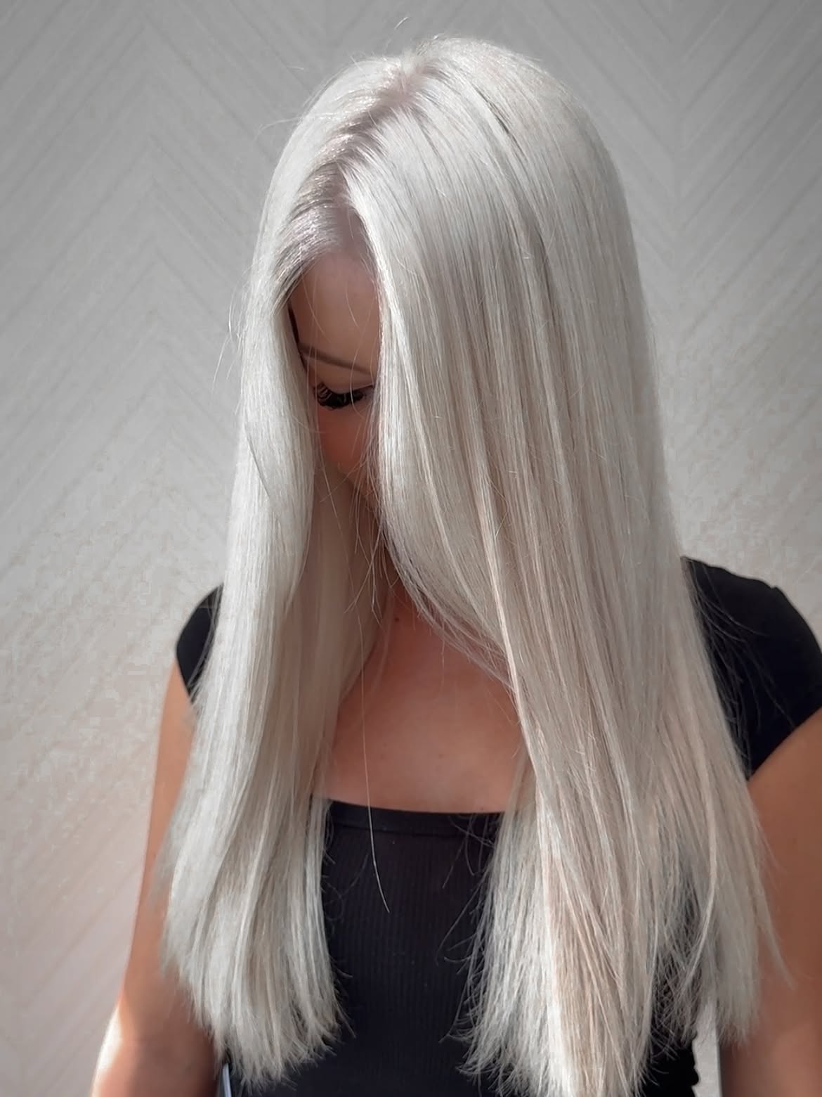 Sleek Platinum Blonde Long Layers With Middle Part