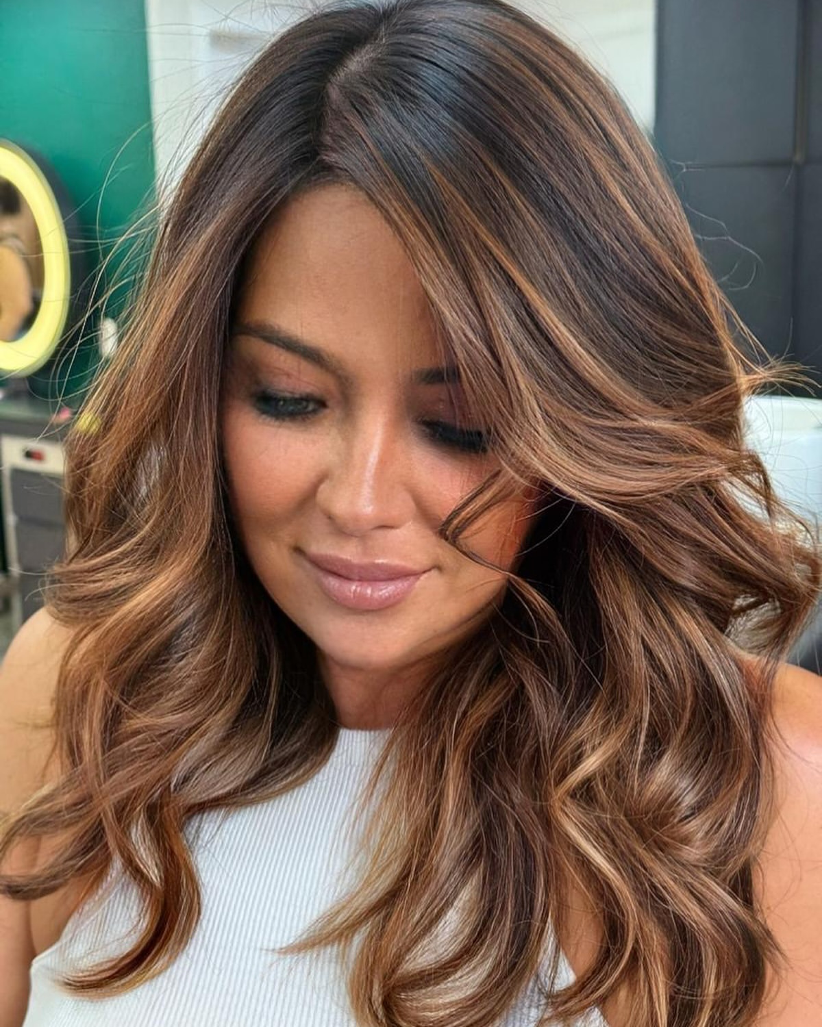 Soft Caramel Balayage On Brunette Layered Waves