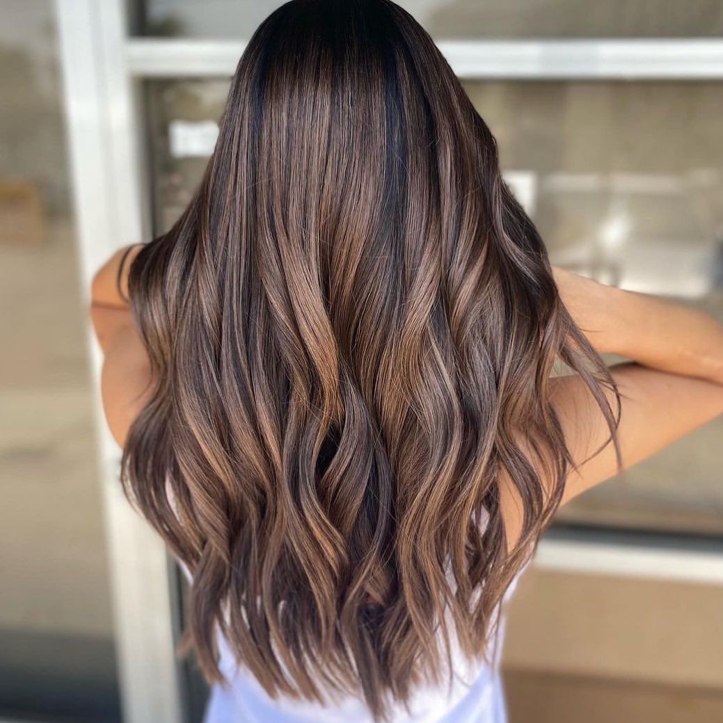 Soft Caramel Balayage On Long Brunette Layers
