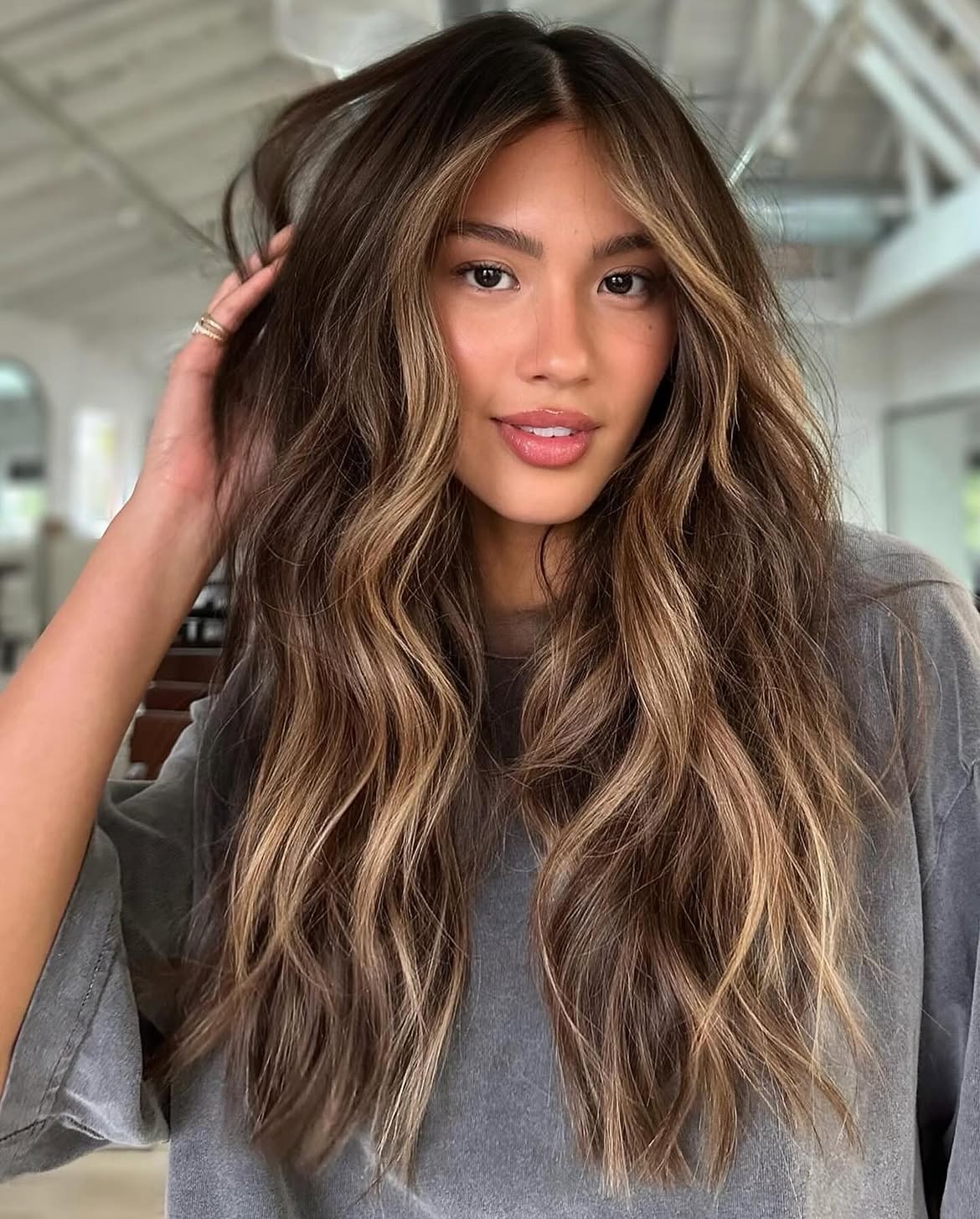 Soft Caramel Balayage On Long Face Framing Layers