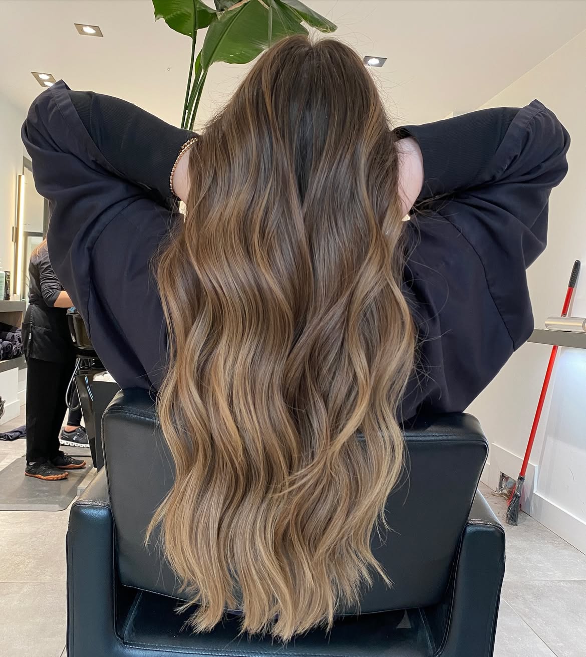 Soft Caramel Balayage On Long Wavy Layers