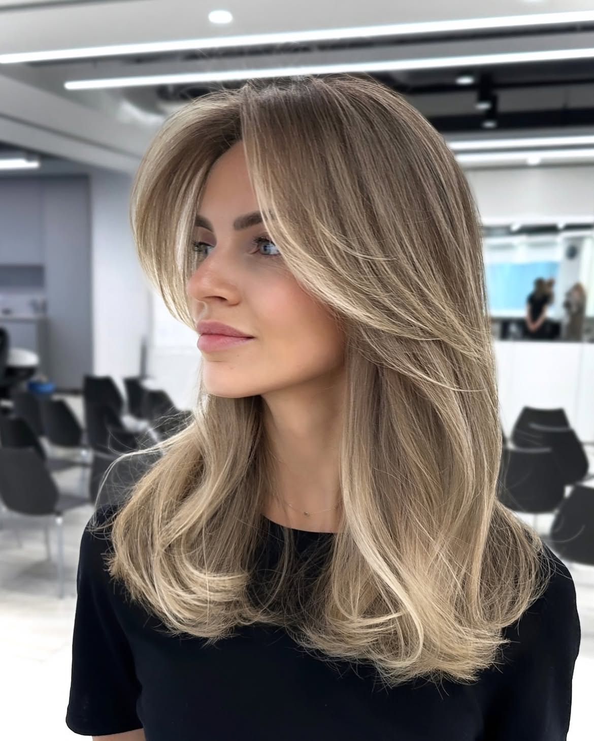 Soft Face Framing Layers On Ash Blonde Balayage