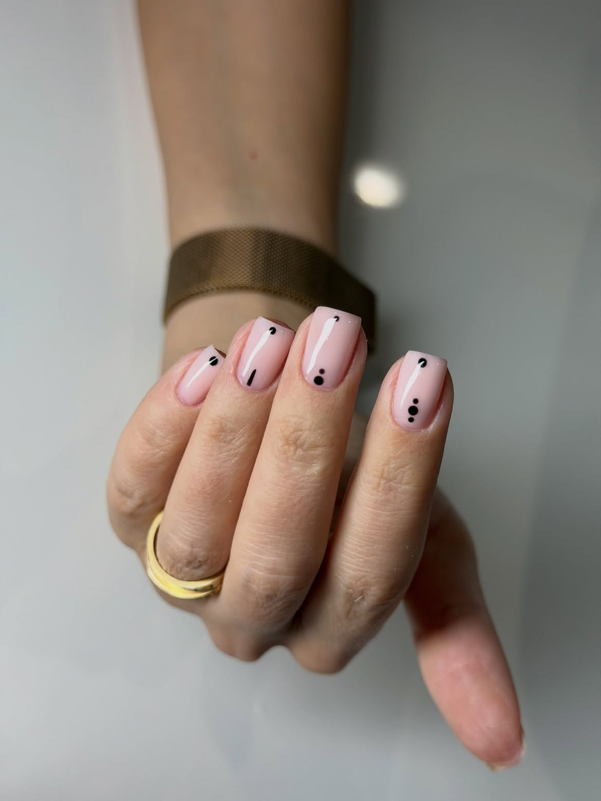 Soft Pink Nails with Minimalist Black Dot Art