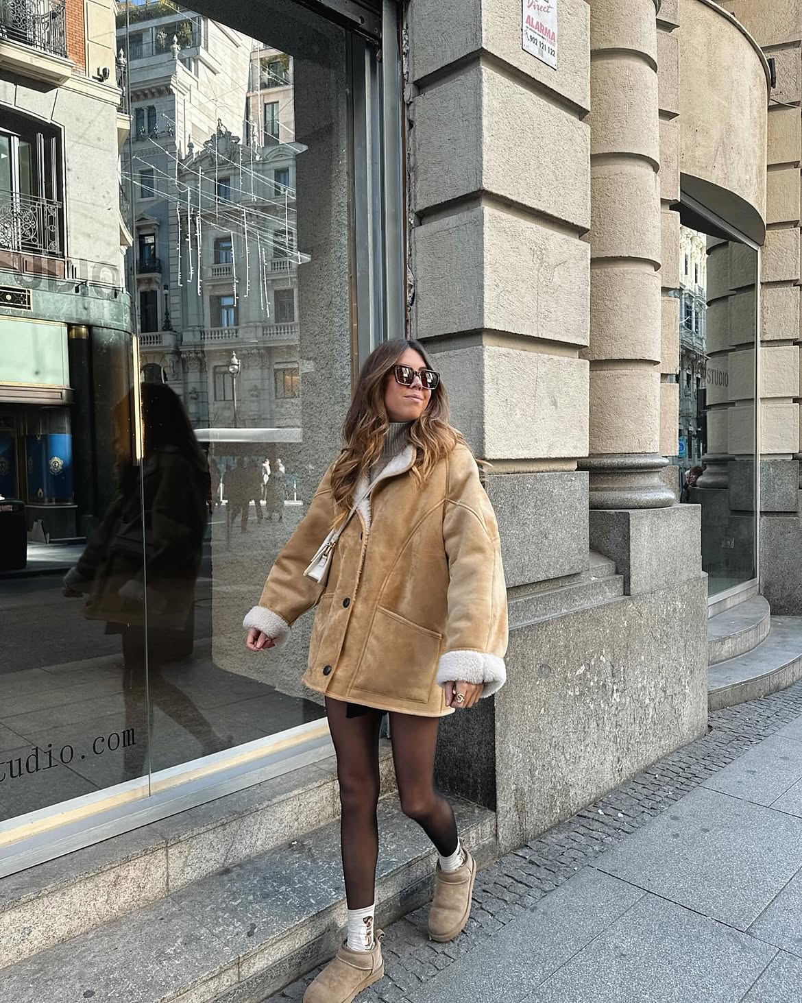 Tan Shearling Jacket With Black Skirt And Tights