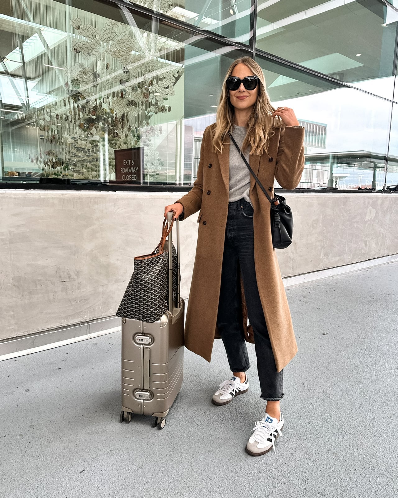 Long brown wool coat over gray sweater and jeans Long brown wool coat over gray sweater and jeans — Airport Outfits