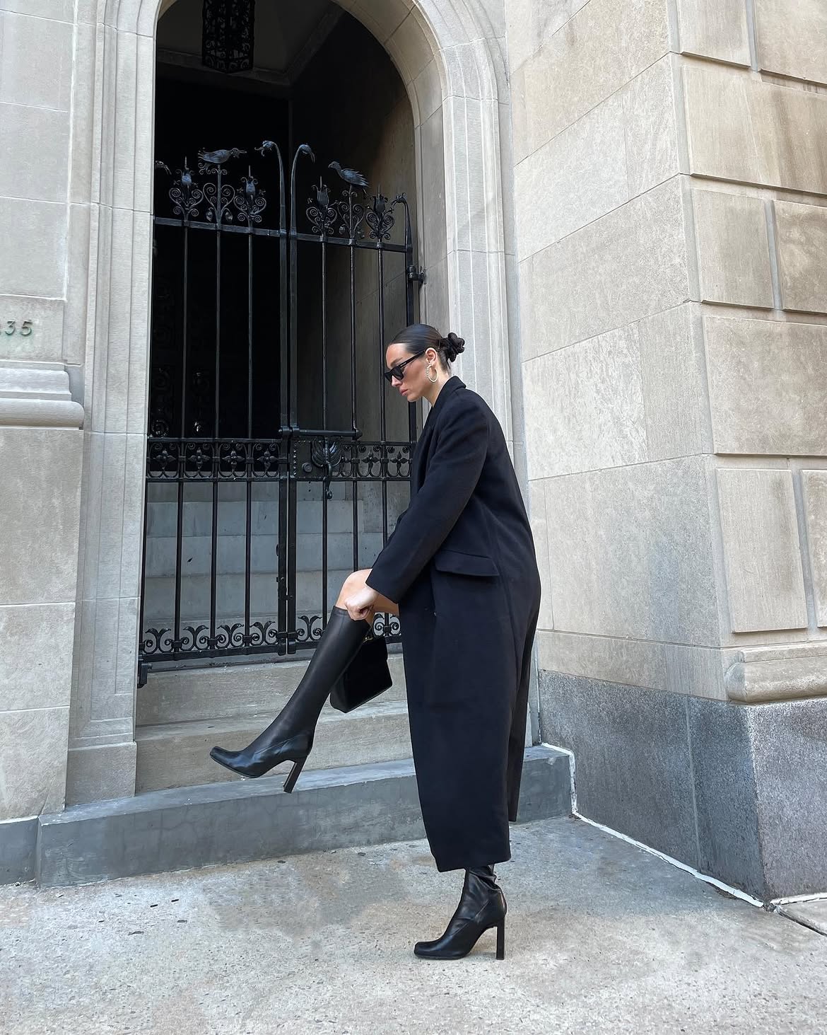 All Black Long Coat And Knee High Boots