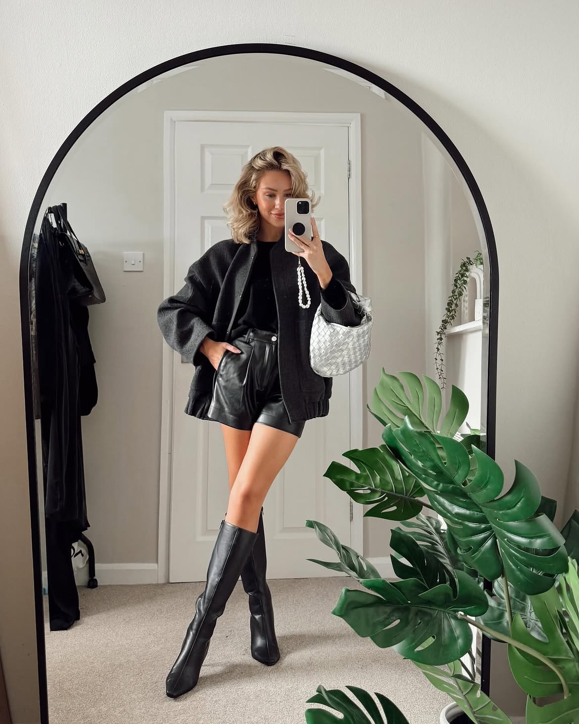 All Black Outfit With Leather Shorts And Knee High Boots