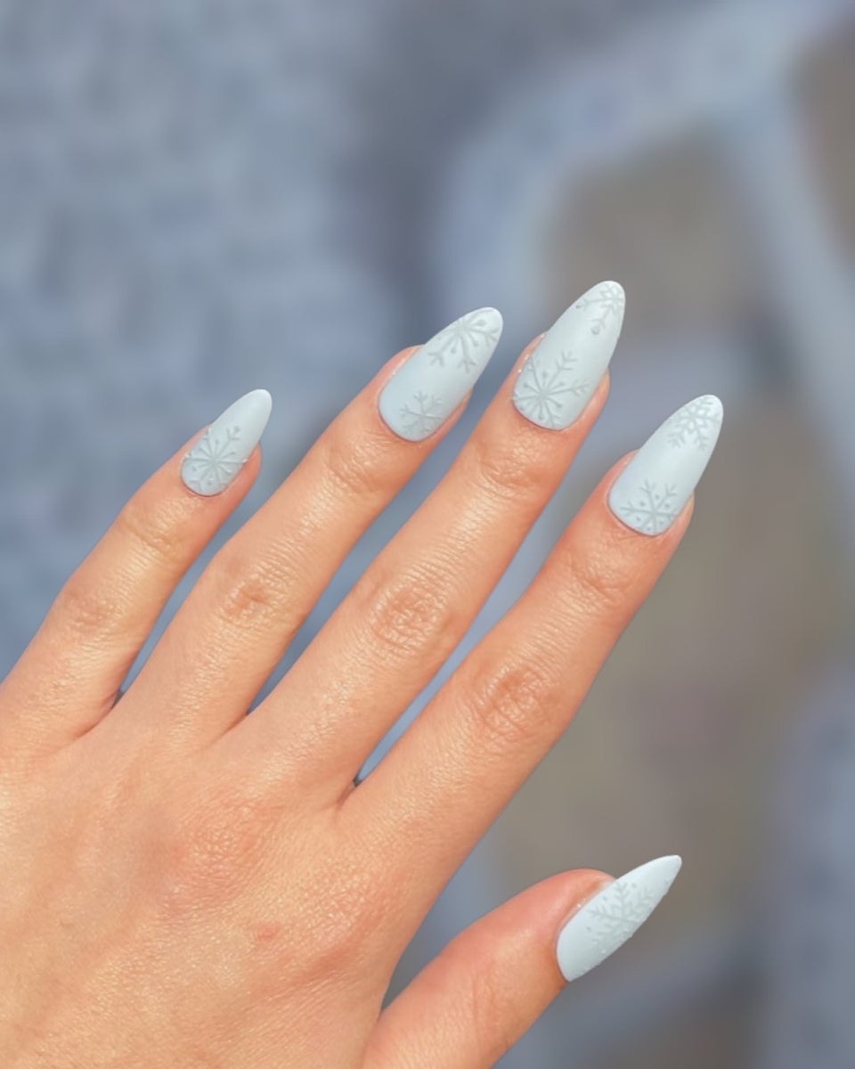 Matte Powder Blue Nails with Embossed Snowflakes Matte Powder Blue Nails with Embossed Snowflakes — Baby Blue Nails