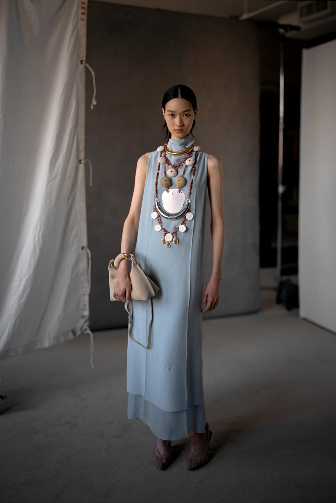 Baby Blue Oversized Vest Over Cream Top with Wide Leg Trousers Baby Blue Oversized Vest Over Cream Top with Wide Leg Trousers — Baby Blue Outfits
