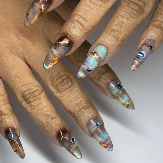 Marbled Blue Brown Beige Stiletto Nails with Gems Marbled Blue Brown Beige Stiletto Nails with Gems — Baddie Nails