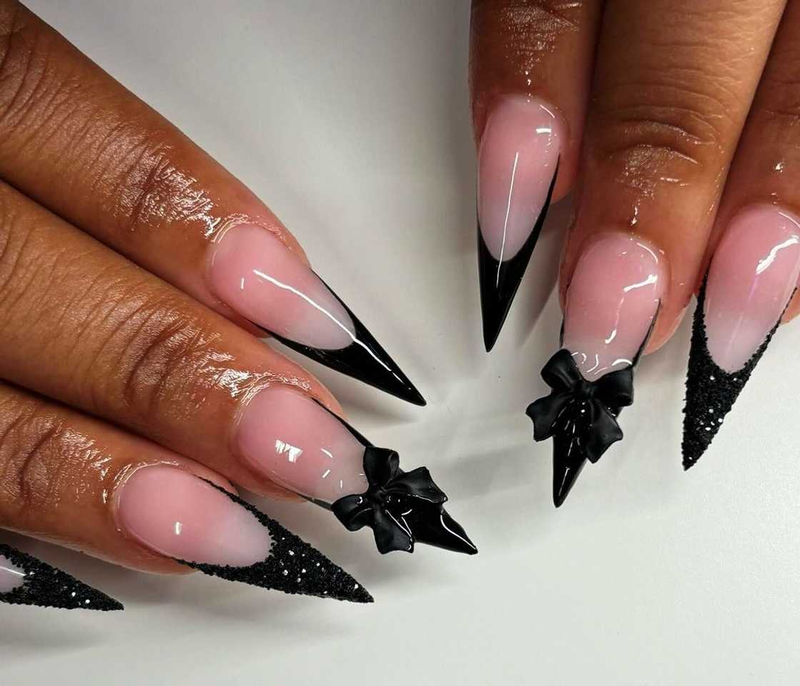 Sheer Pink Stiletto Nails with Black Bows and Glitter Sheer Pink Stiletto Nails with Black Bows and Glitter — Baddie Nails